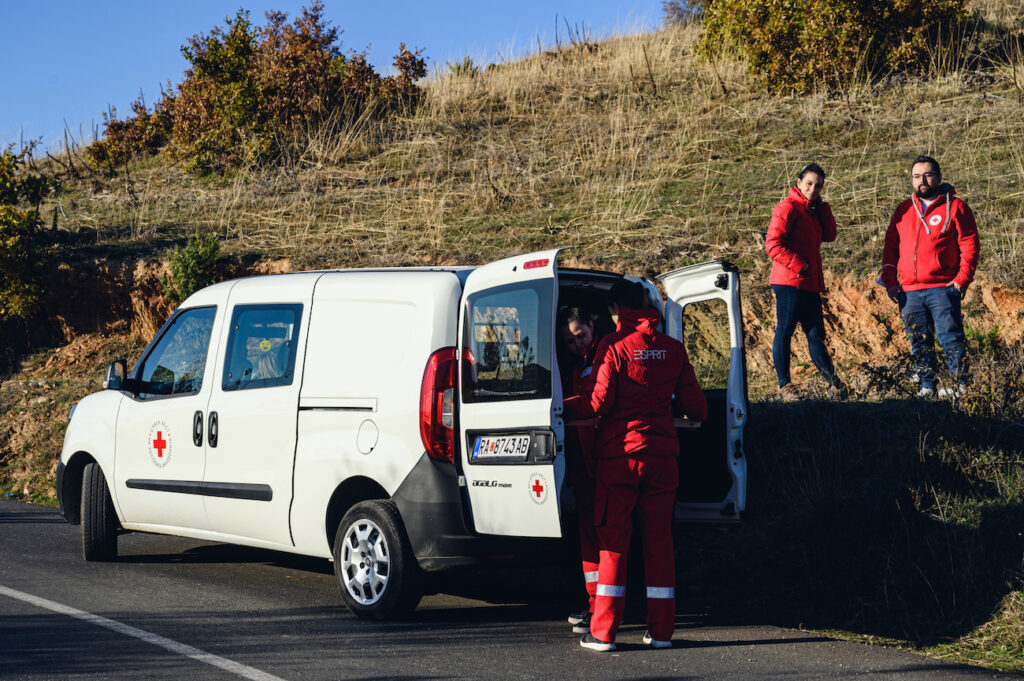 Red cross stand